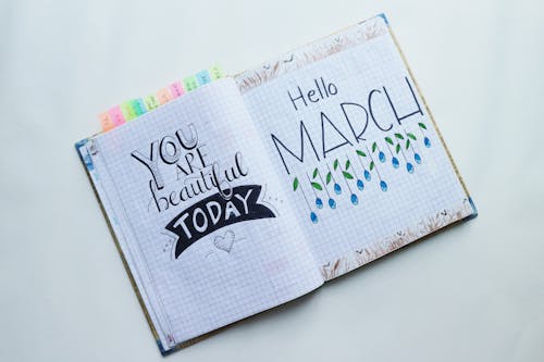 Free Book Page With Hello March Text Stock Photo