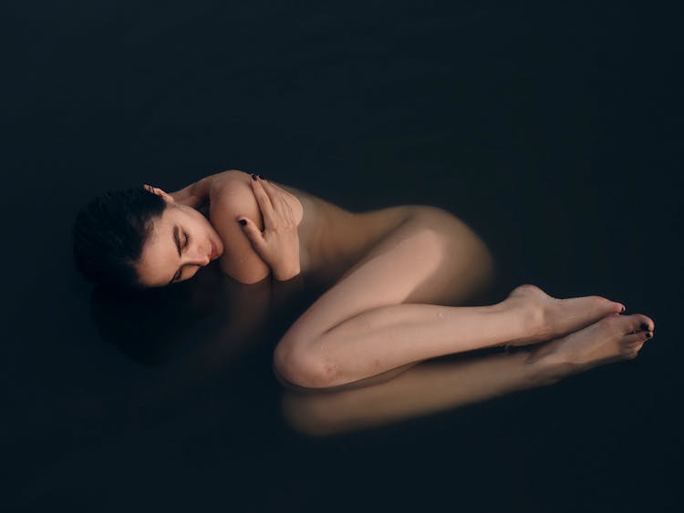 Naked Woman On Water