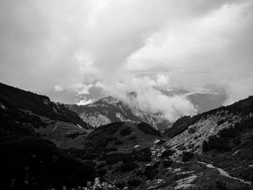 Grayscale Photo of Mountains