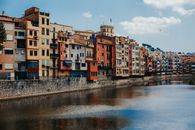 Apartment Buildings Near a Onyar River · Free Stock Photo
