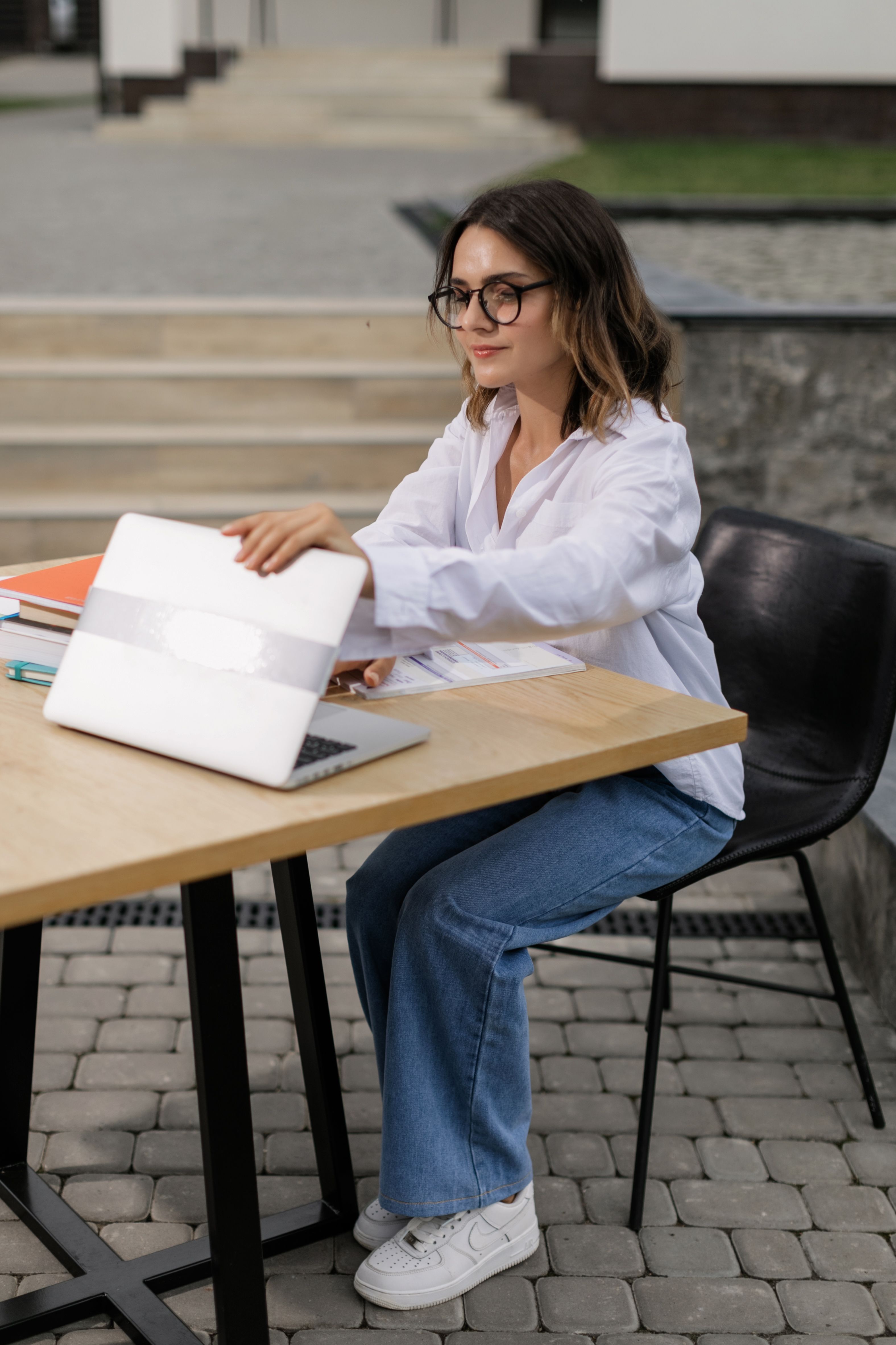 A Woman in White Long Sleeves Having an Online Class · Free Stock Photo