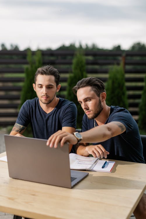 Men Sitting at the Table