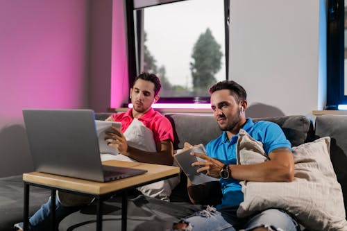 Men Sitting on the Couch