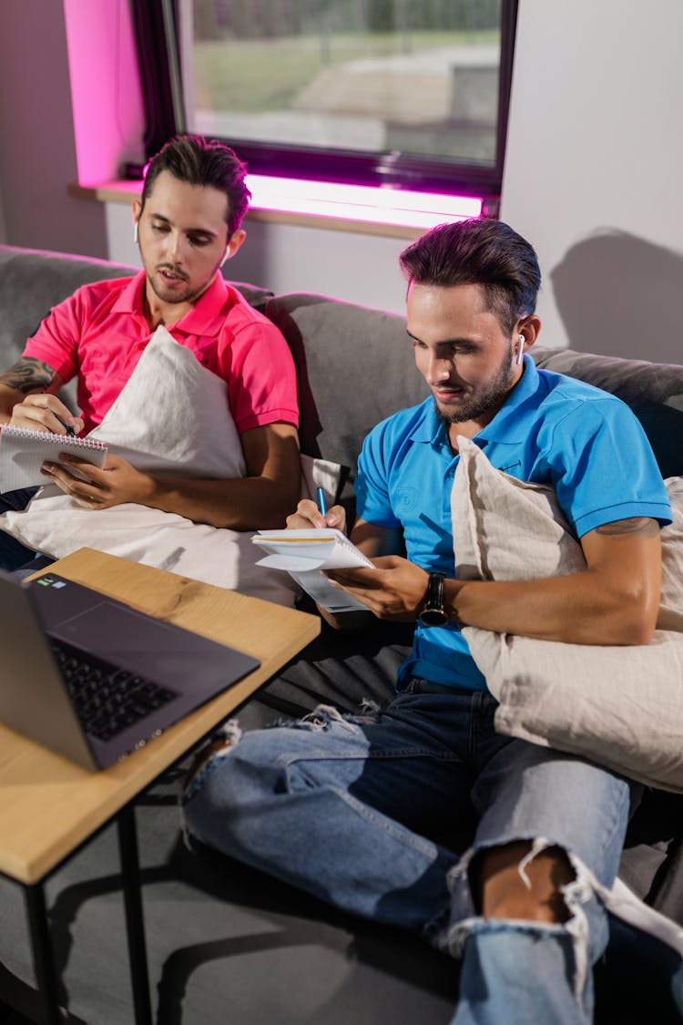 Twin Brothers Listening To The Online Lesson