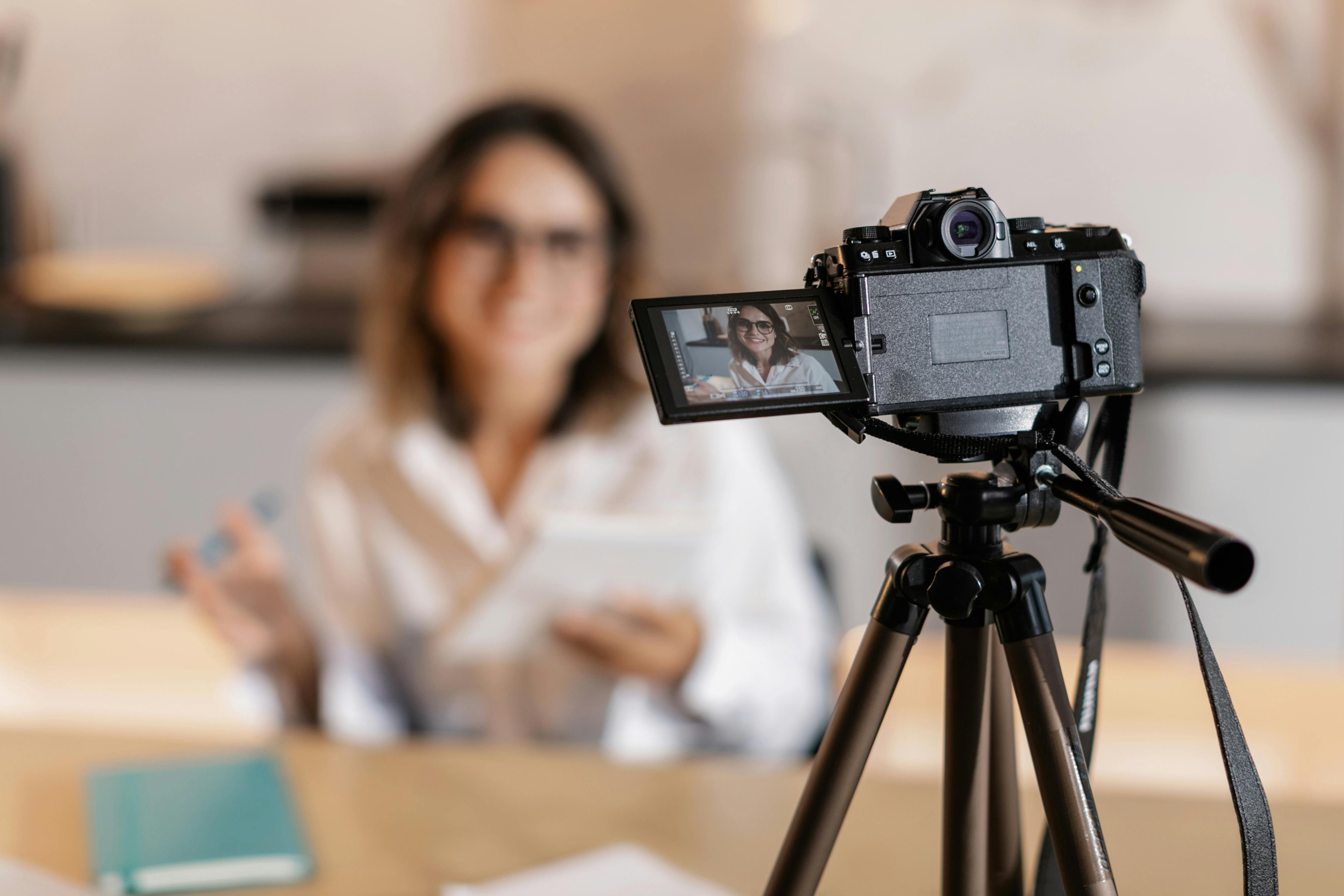 A camera recording a person