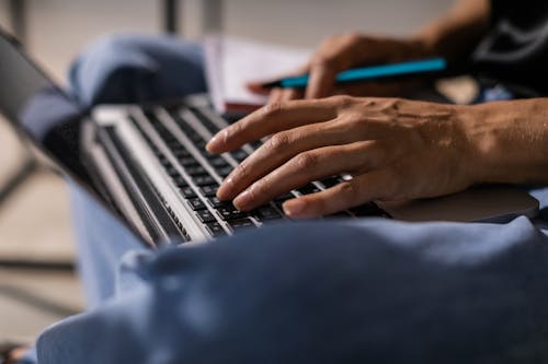 Woman with a Laptop in her Lap 