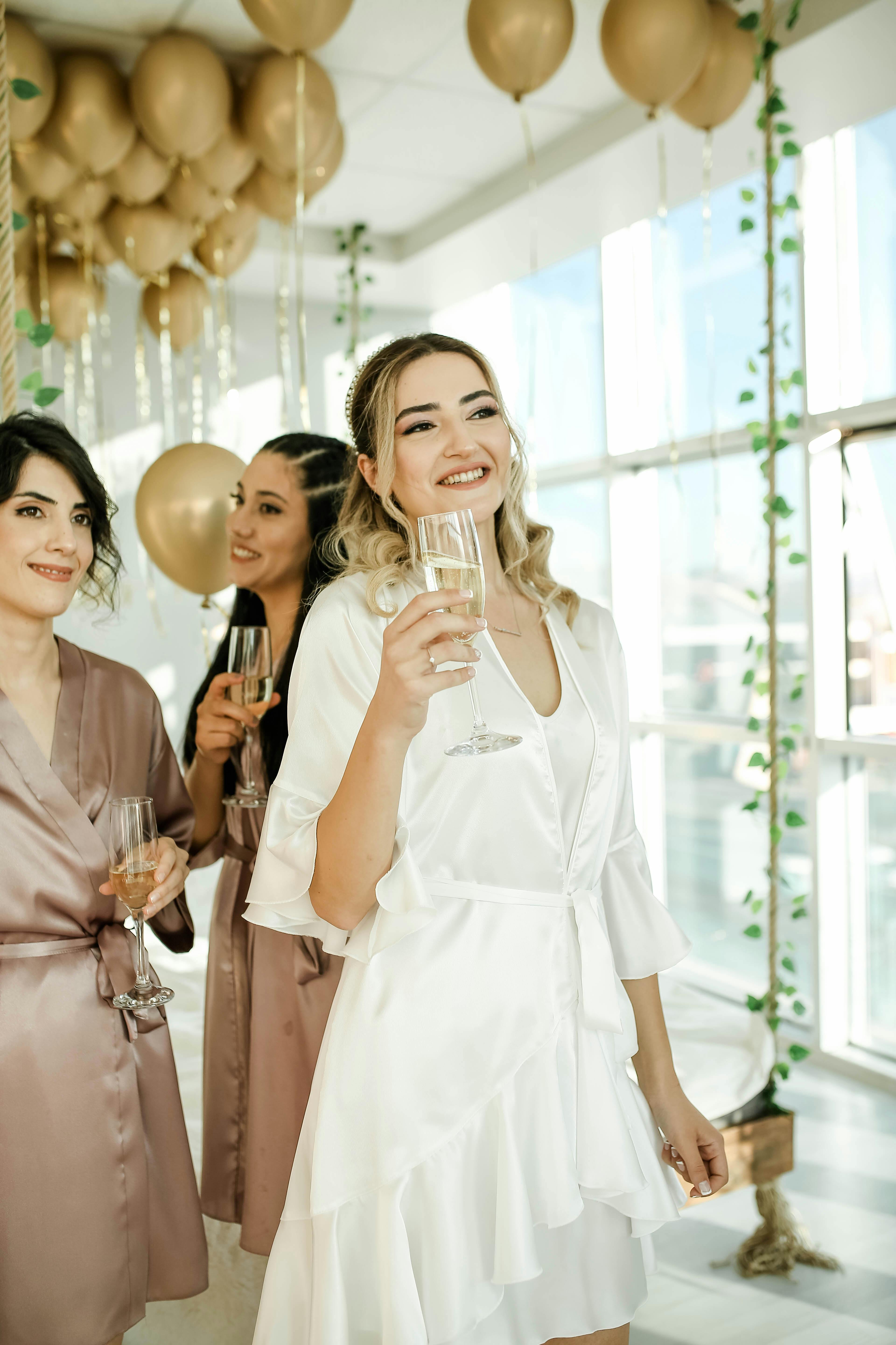 Bride and Bridesmaids Drinking Champagne at Party · Free Stock Photo