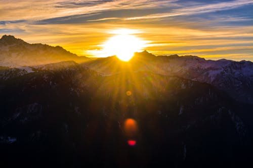 Silhouette of Mountains during Sunrise