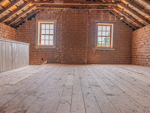 Empty attic with wooden rafters