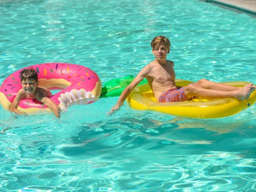 Boys Swimming in the Pool