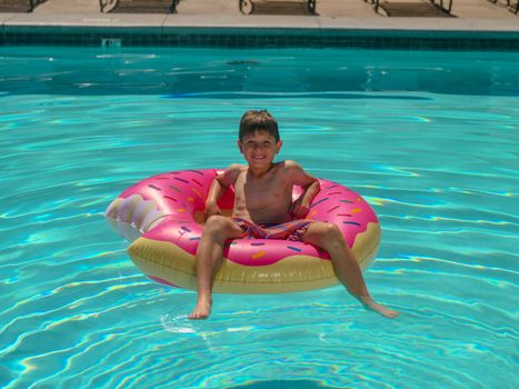A Boy Swimming in the Pool