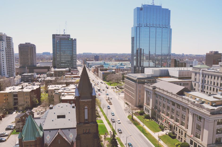 Scenic aerial cityscape of London, Ontario with modern architecture and busy streets.