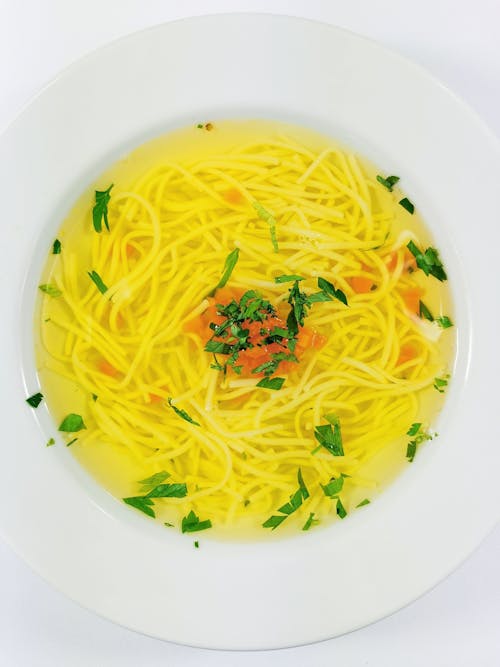 Free Noodles with Soup in a Bowl Stock Photo