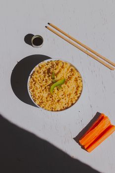Noodles And Vegetables Including Carrots Fish