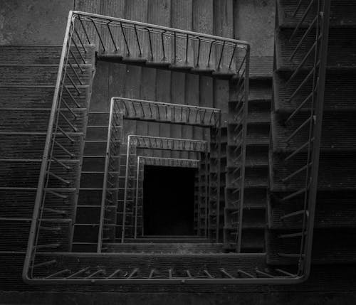 Grayscale Photo of a Stairwell
