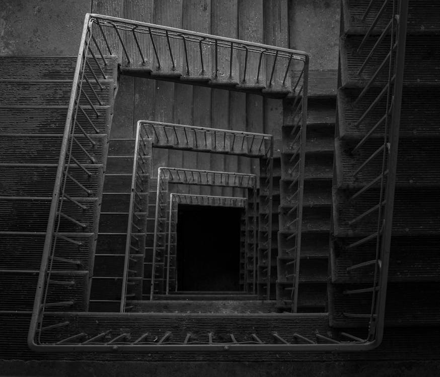 Grayscale Photo of a Stairwell