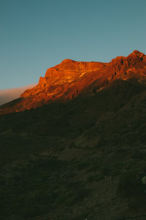 Brown Rocky Mountain Under Blue Sky