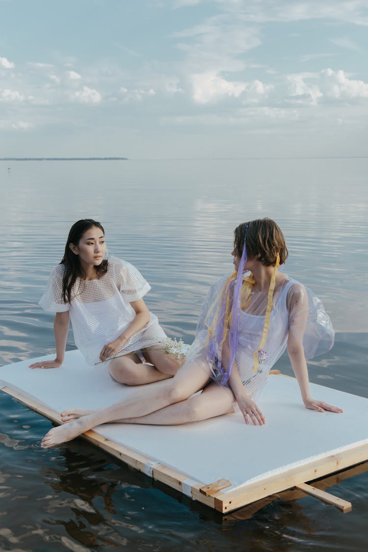 Women Sitting On The Raft