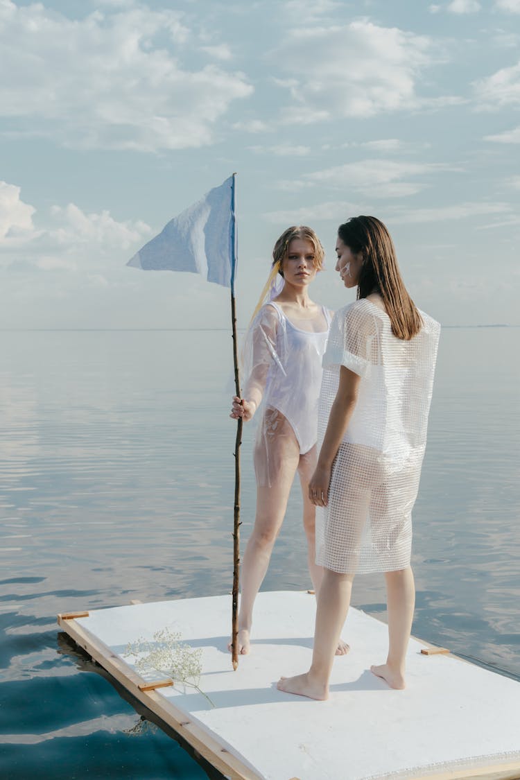 Women Standing On A Raft 