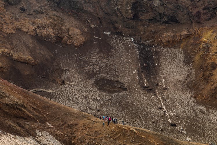 People Hiking In Mountains