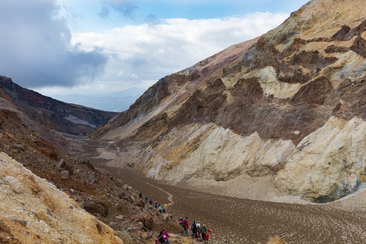 People Hiking In Gauge 