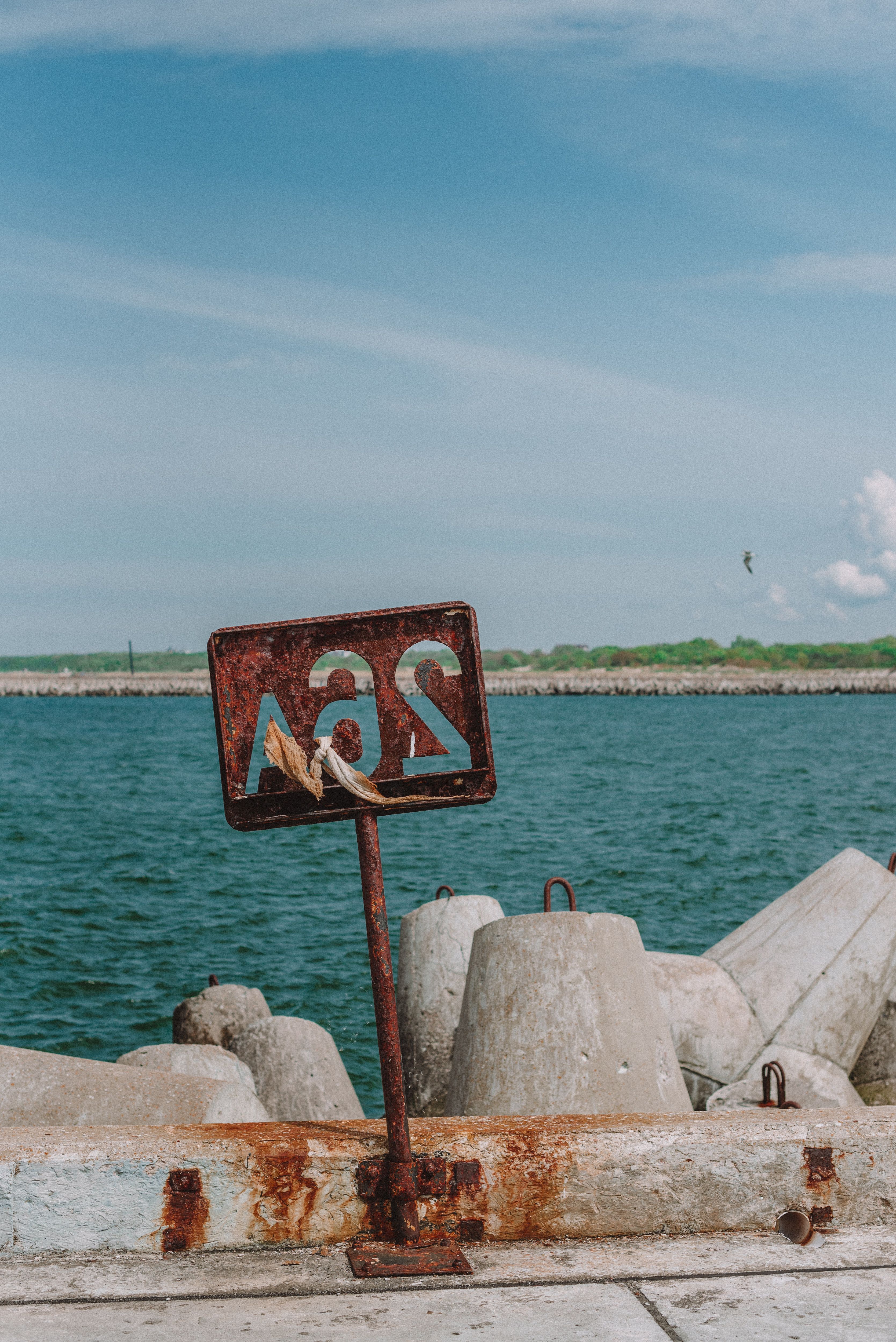 Rusty Signage on Coast · Free Stock Photo