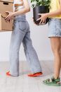 Person in Blue Denim Jeans and Yellow Shirt