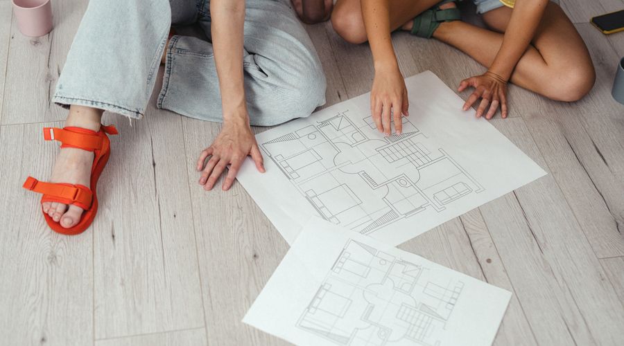 Homeowner planning renovation projects with notebook