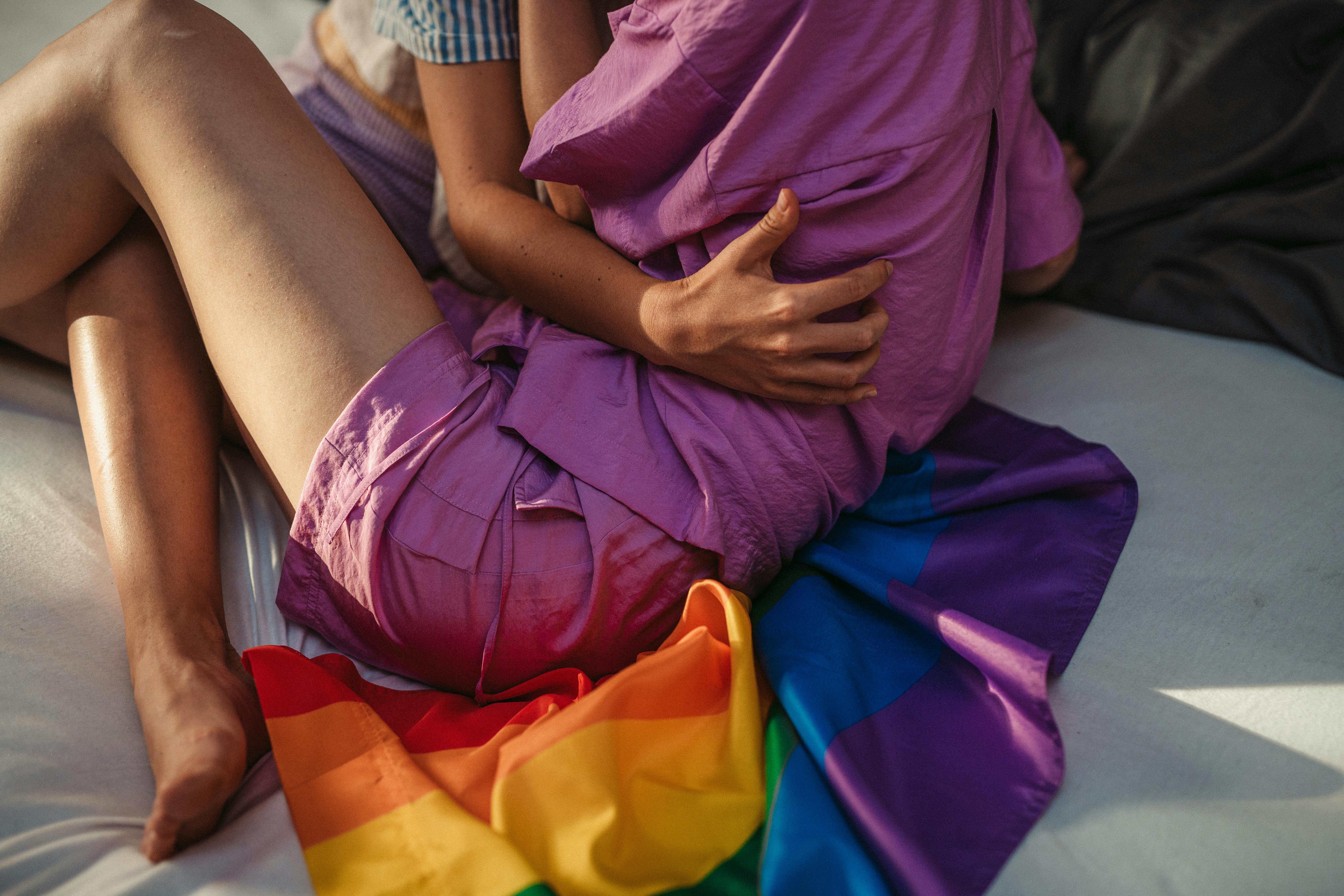 a couple sitting on the floor