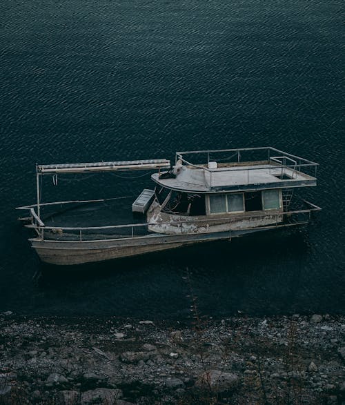 Abandoned Boat in Water