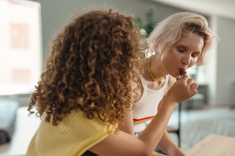 A Woman Eating Strawberry