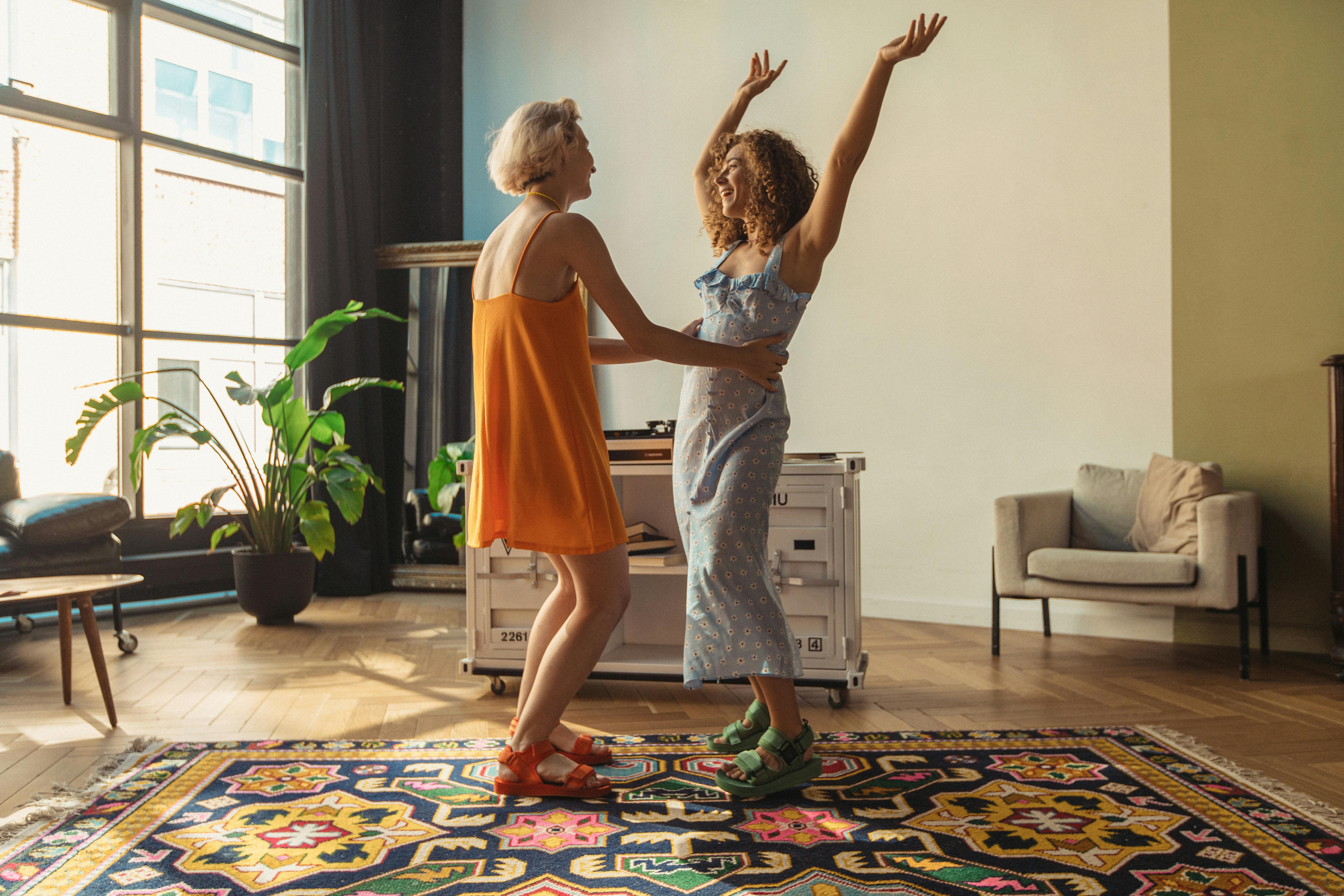 women dancing at home