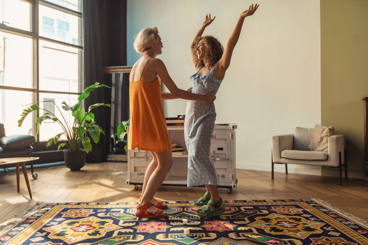 Women Dancing At Home