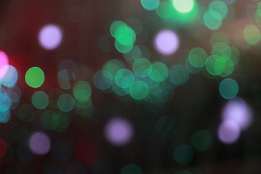Vibrant circular bokeh lights in a colorful and abstract pattern.