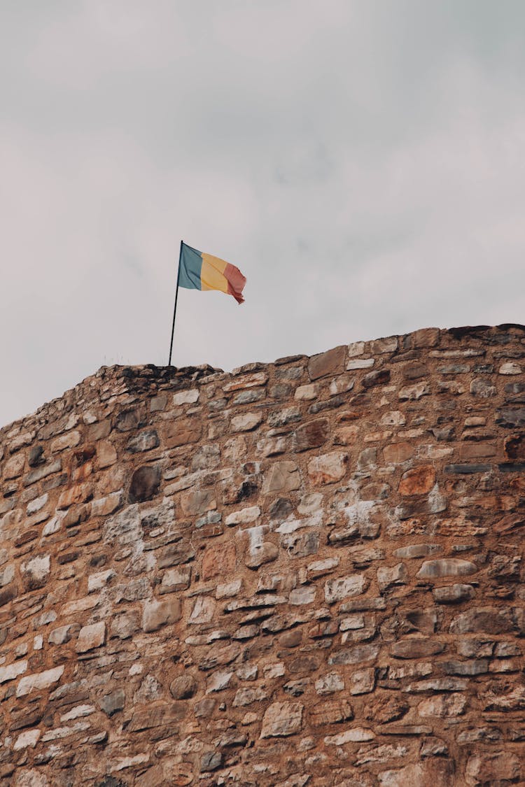 Romanian Flag On Castle Wall