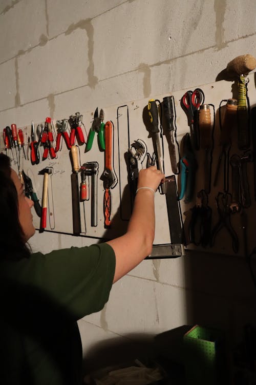 Free Hand Tools Hanging on the Wall Stock Photo
