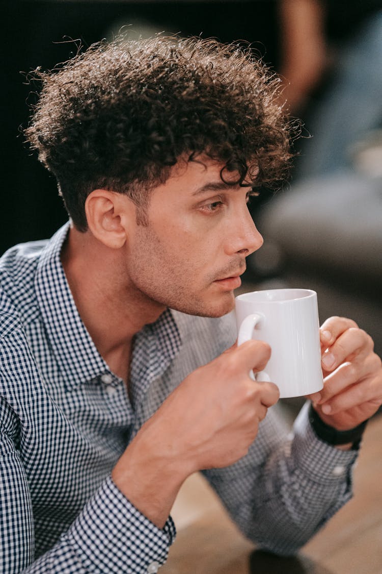 Man Holding A Mug 