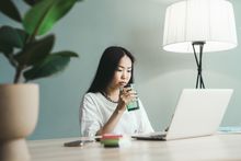 Teammate at a desk with a plant — photo by SHVETS production on Pexels