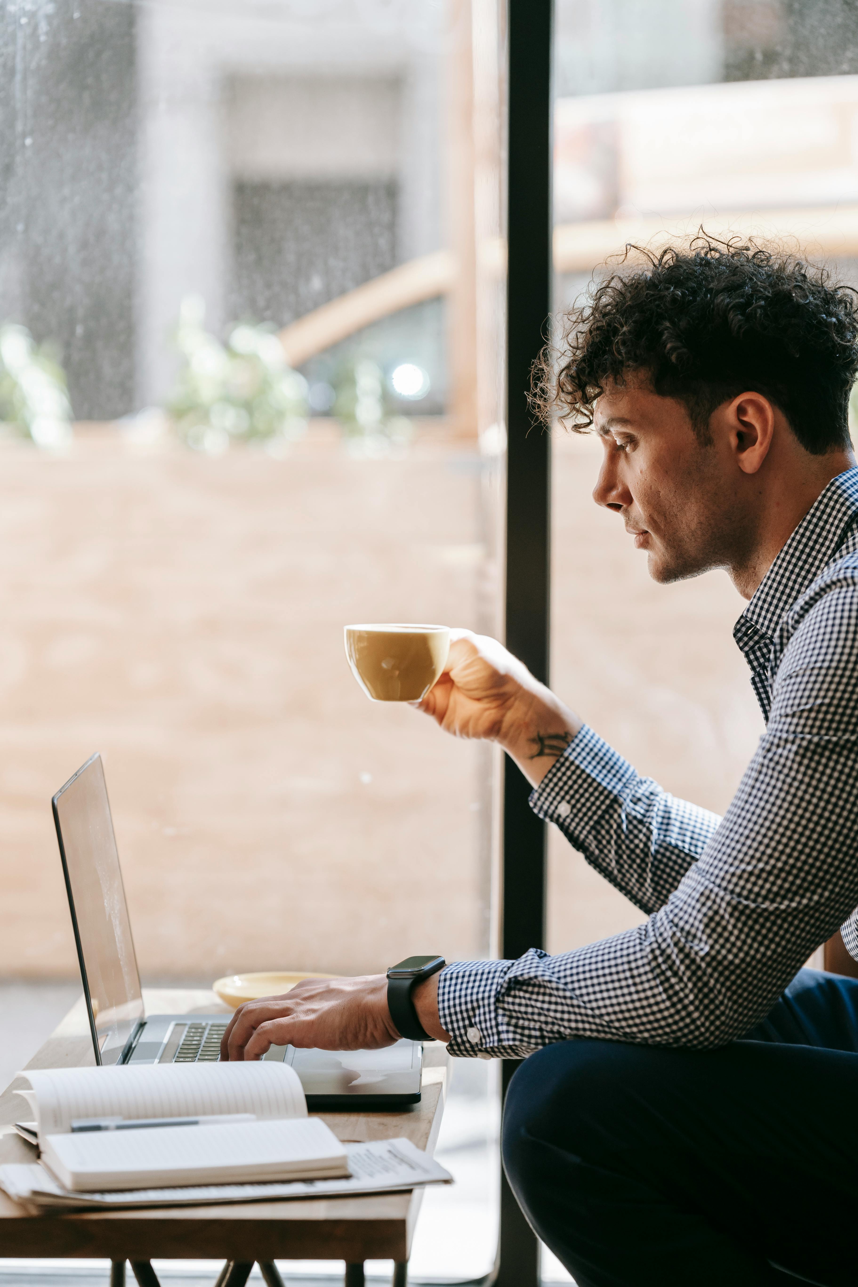 A Man Sitting at the Table · Free Stock Photo