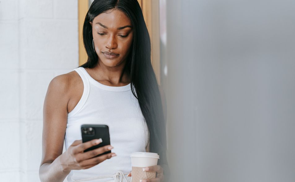 couple enjoying a coffee date while using a dating app
