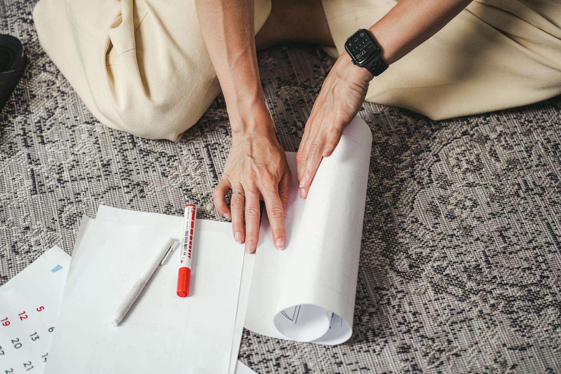A Person Holding a White Printer Paper