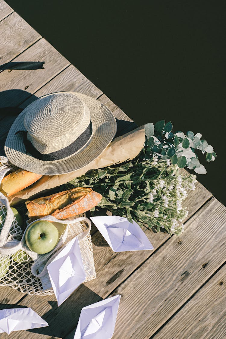 Brown Hat On Wooden Dock