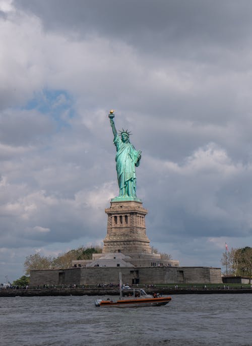 Free Liberty Statue under The Clouds Stock Photo