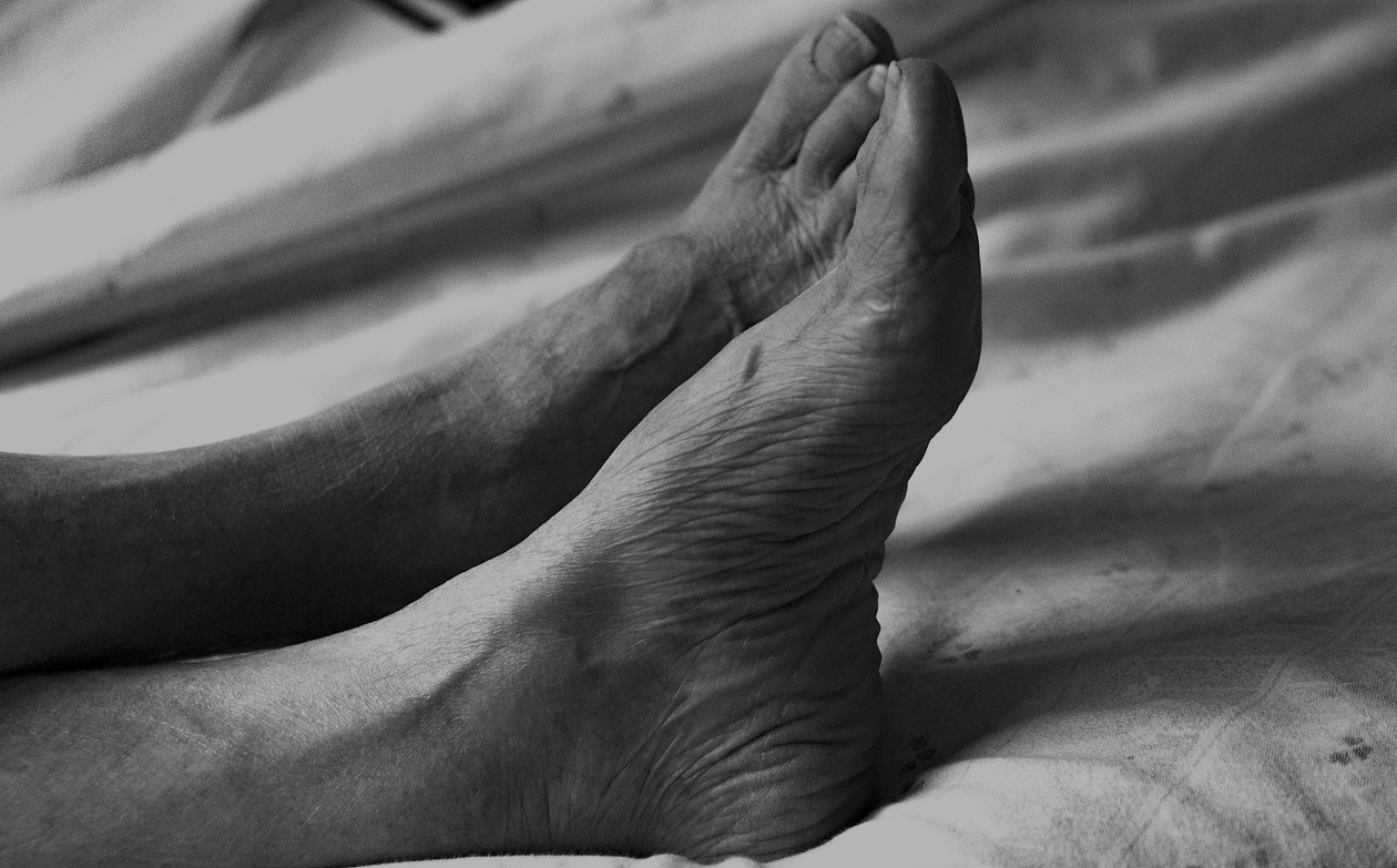 Close-up of an elderly person's feet