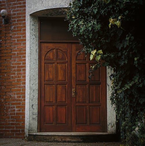 Brown Wooden Front Door of House
