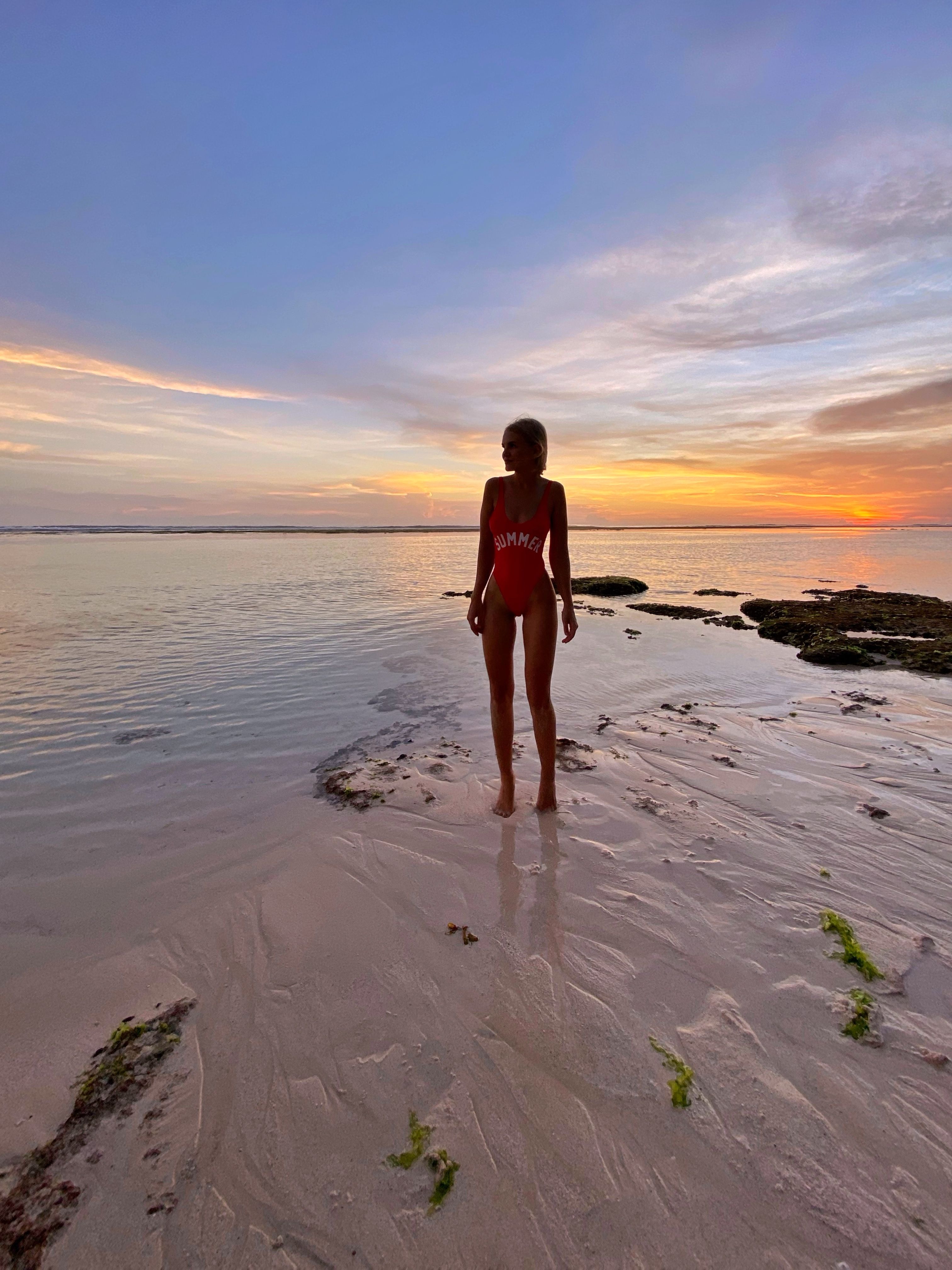 Woman on Beach at Sunset · Free Stock Photo