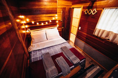A Bedroom in a Wooden Cabin