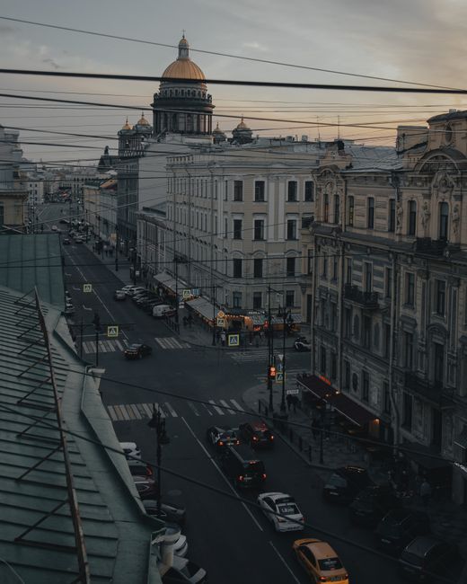 Aerial cityscape of Saint Petersburg's historic buildings at twilight.