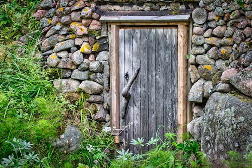 Gratis Fotos de stock gratuitas de Entrada, piedras, puerta de madera Foto de stock