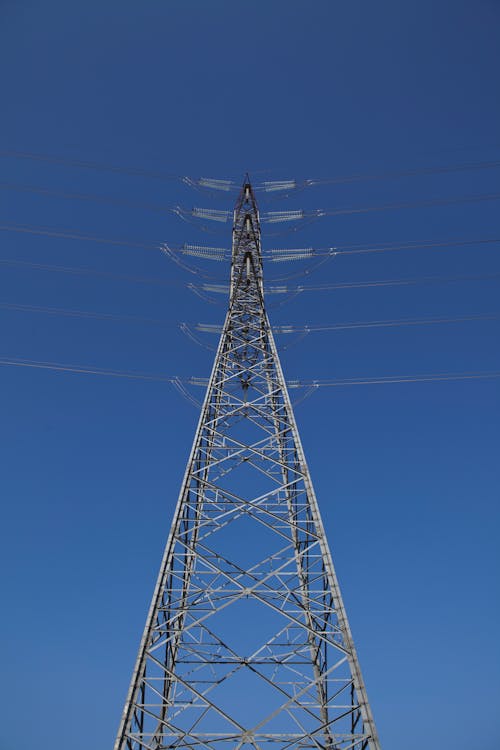 Gray Electric Tower Under Blue Sky